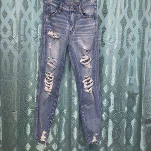Light washed ripped American eagle jeans.